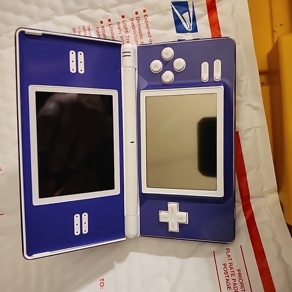 Nintendo DS- Purple And White